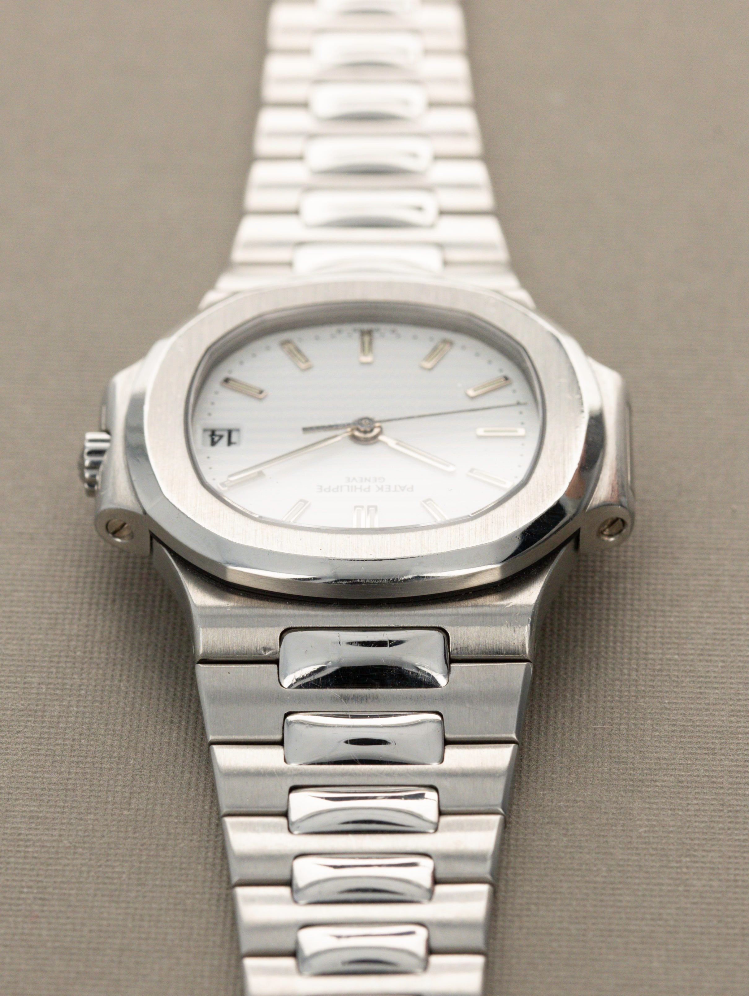 Patek Philippe Nautilus Ref. 3800/1A - The 'Garage Door' Full set