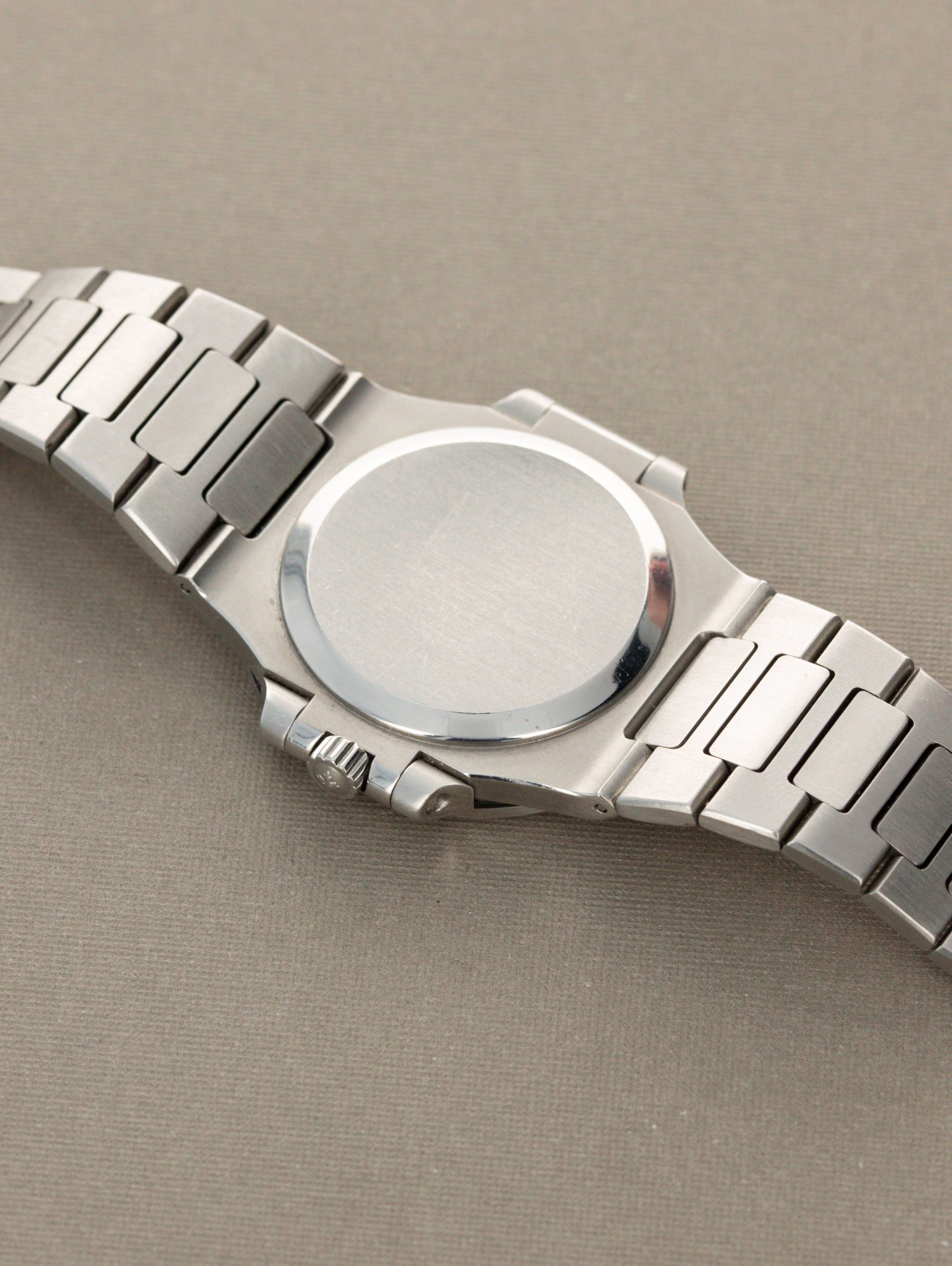 Patek Philippe Nautilus Ref. 3800/1A - The 'Garage Door' Full set