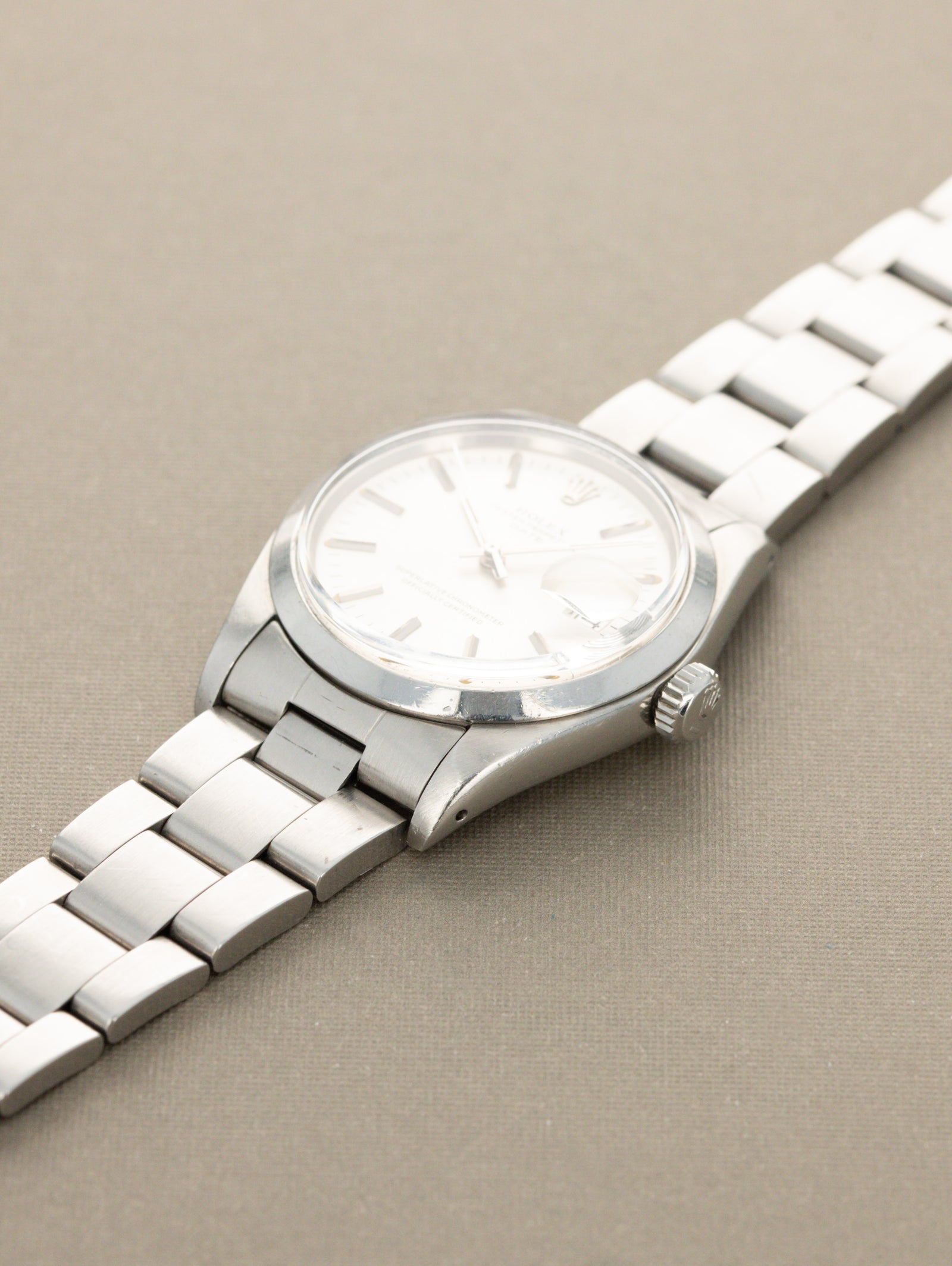 Rolex Oyster Perpetual Date Ref. 1500 - Sunburst Silver 'Sigma' Dial