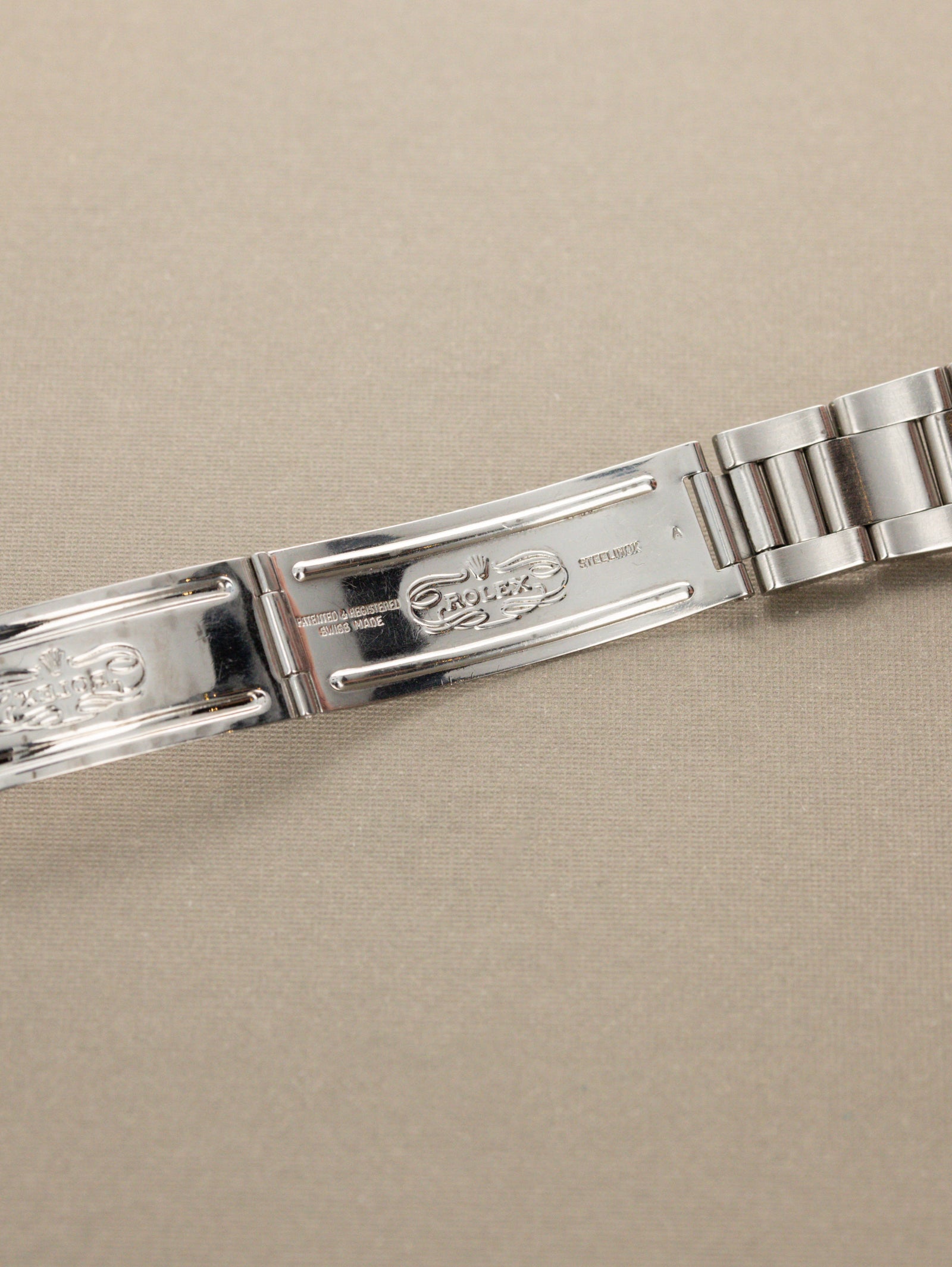 Rolex Oyster Perpetual Date Ref. 1500 - Sunburst Silver 'Sigma' Dial