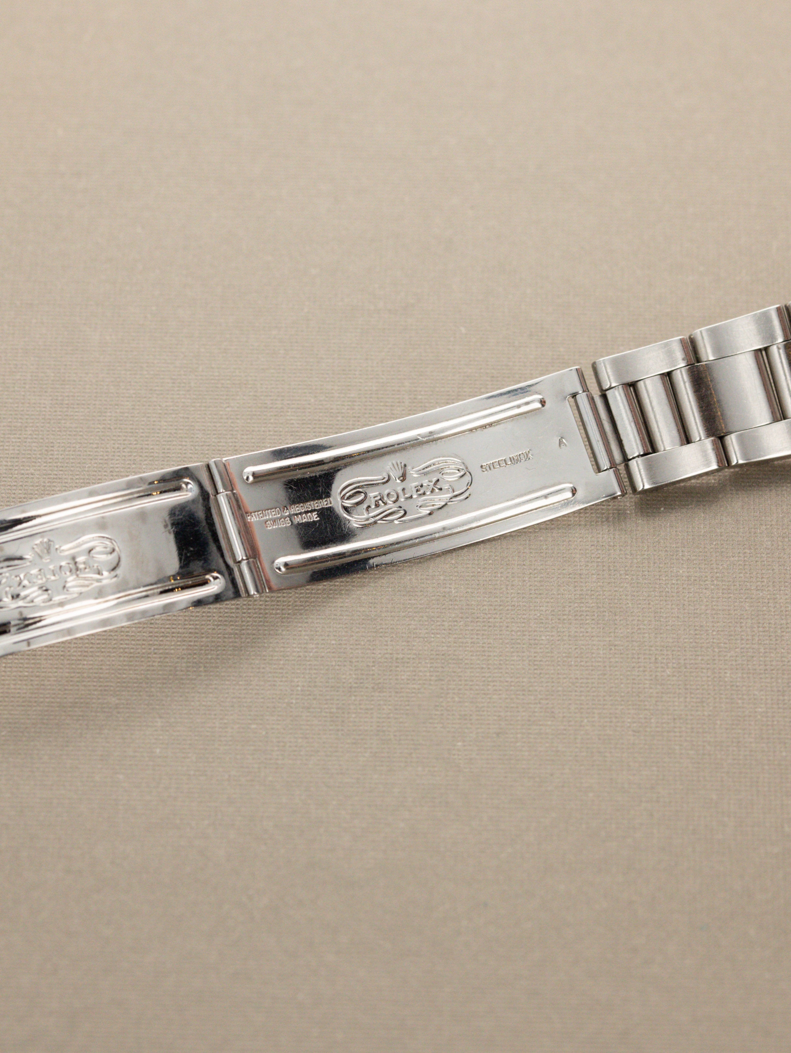 Rolex Oyster Perpetual Date Ref. 1500 - Sunburst Silver 'Sigma' Dial
