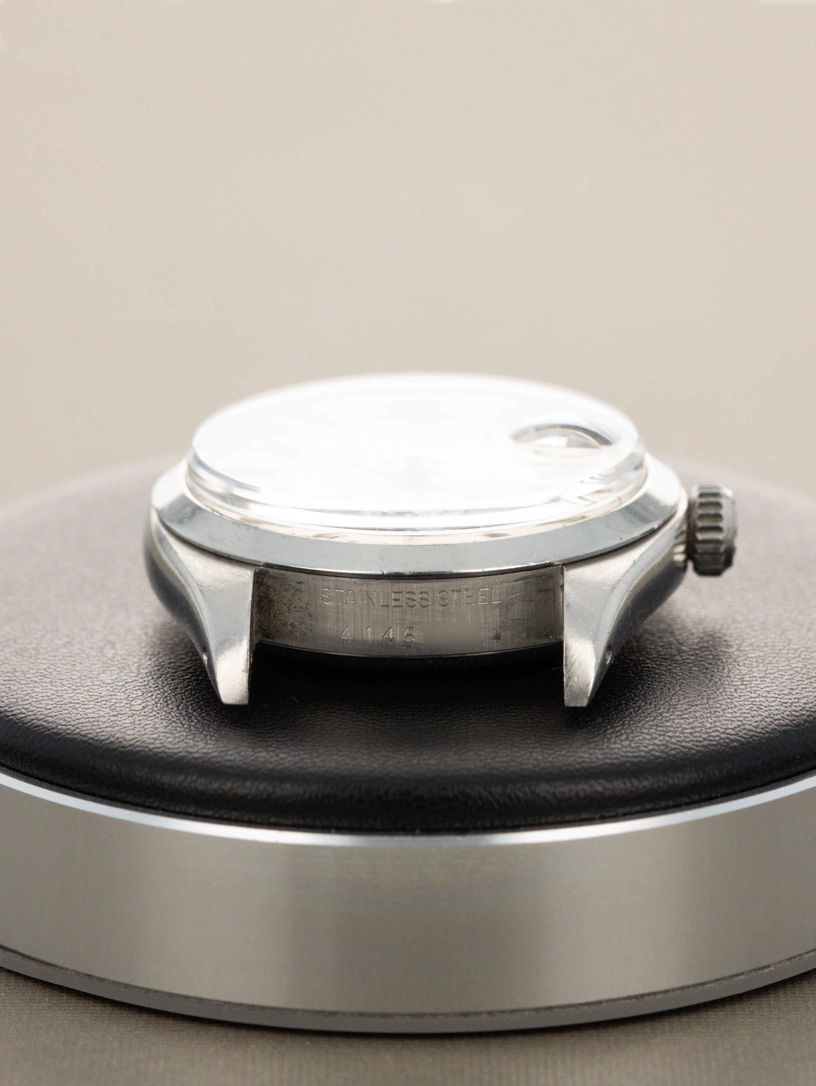 Rolex Oyster Perpetual Date Ref. 1500 - Sunburst Silver 'Sigma' Dial