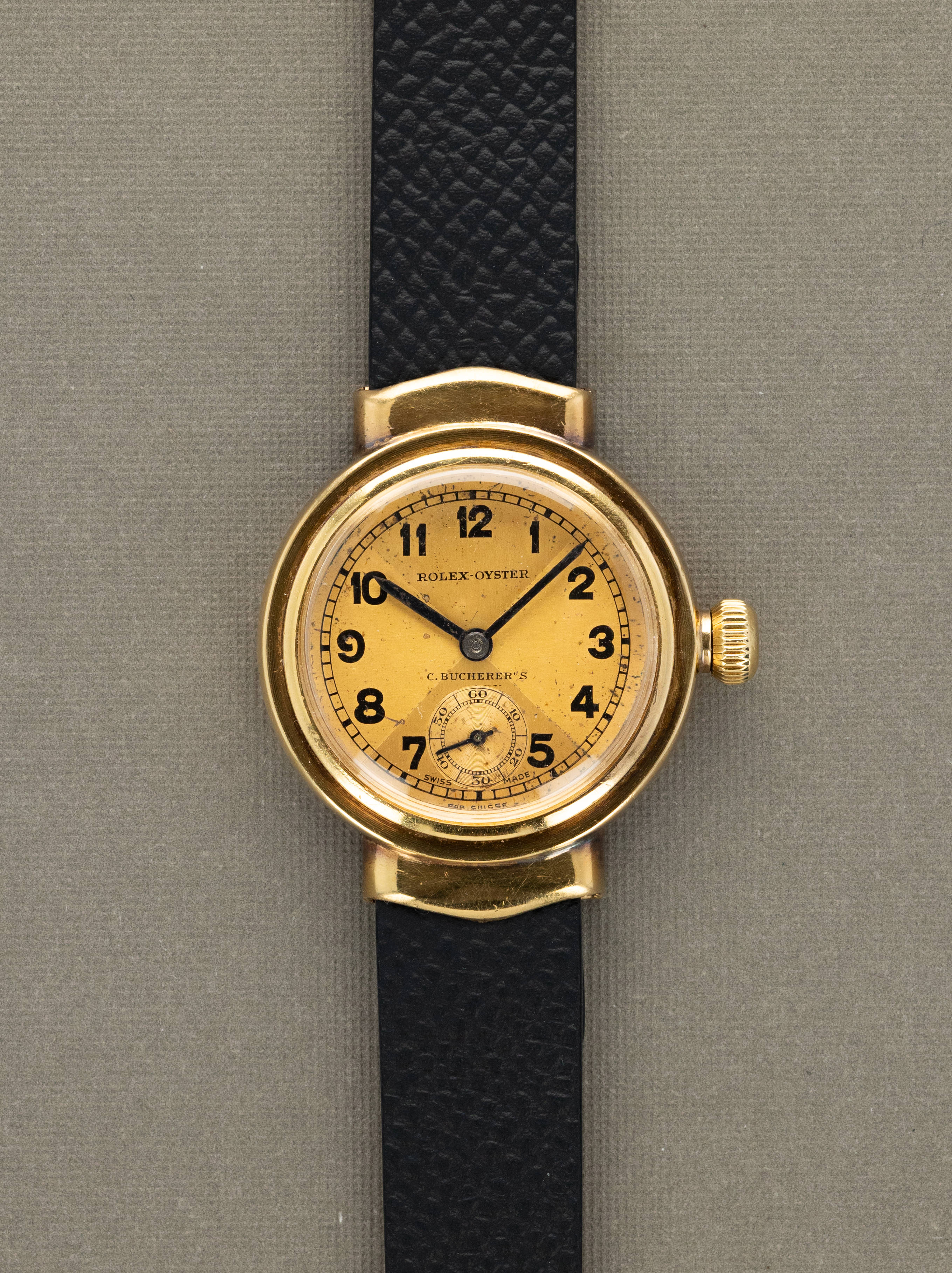 Rolex Oyster 'Hooded Lug' - Champagne 'Bow Tie' Dial 'C. Bucherer's' Signature