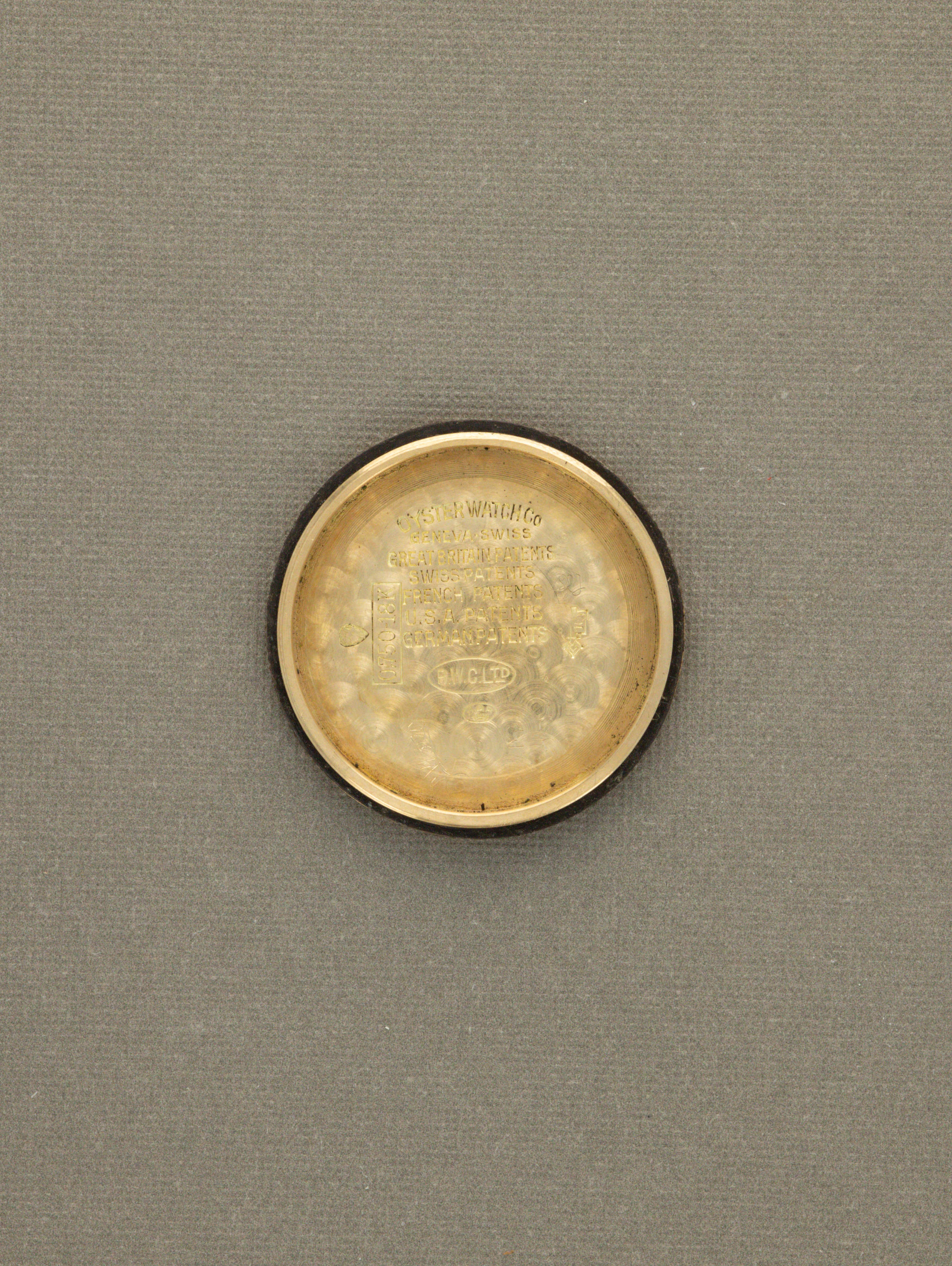 Rolex Oyster 'Hooded Lug' - Champagne 'Bow Tie' Dial 'C. Bucherer's' Signature