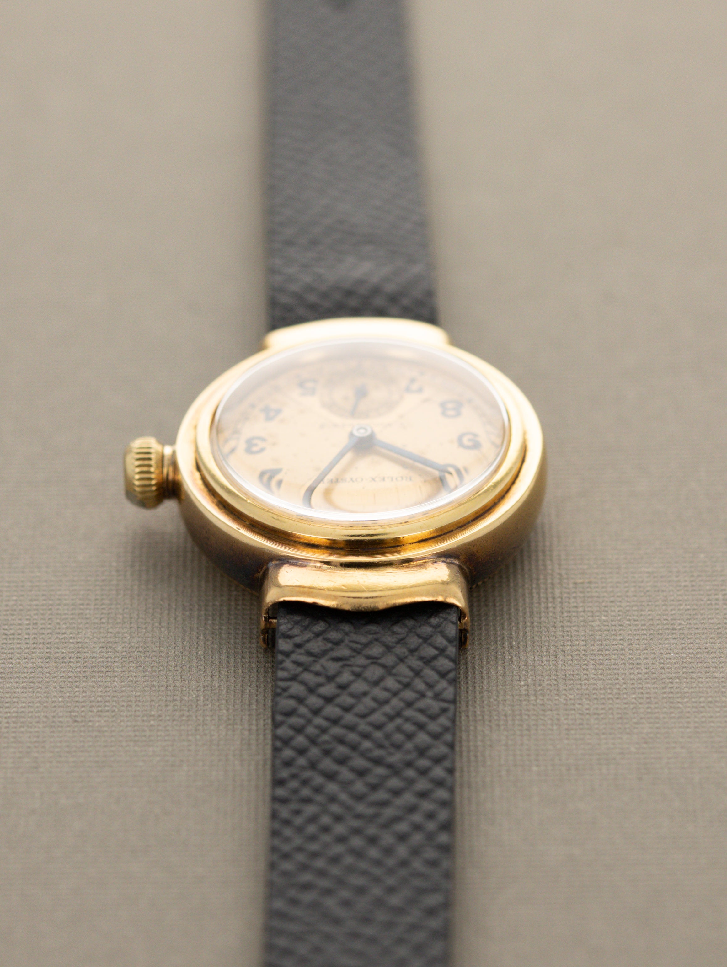 Rolex Oyster 'Hooded Lug' - Champagne 'Bow Tie' Dial 'C. Bucherer's' Signature