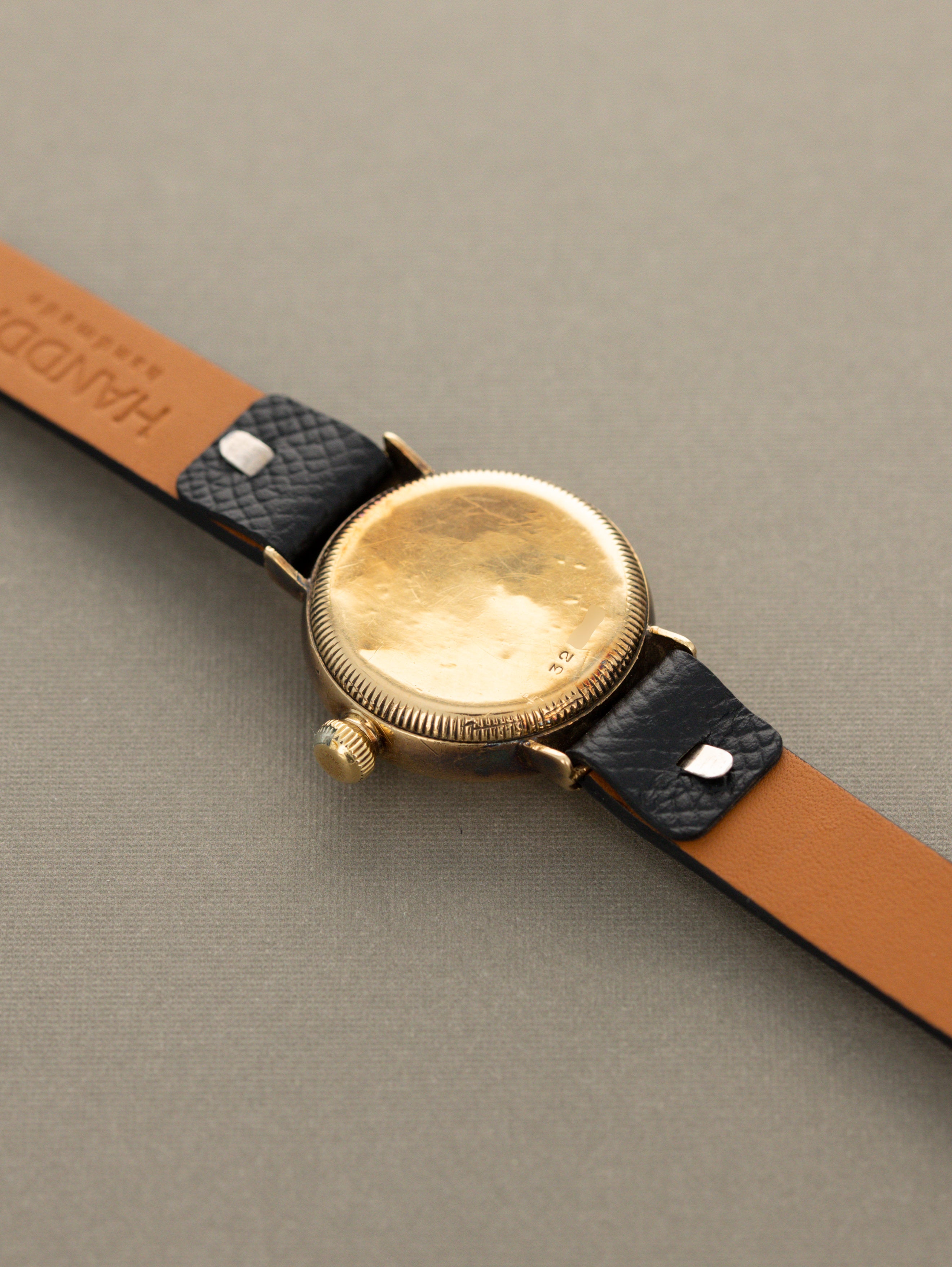 Rolex Oyster 'Hooded Lug' - Champagne 'Bow Tie' Dial 'C. Bucherer's' Signature