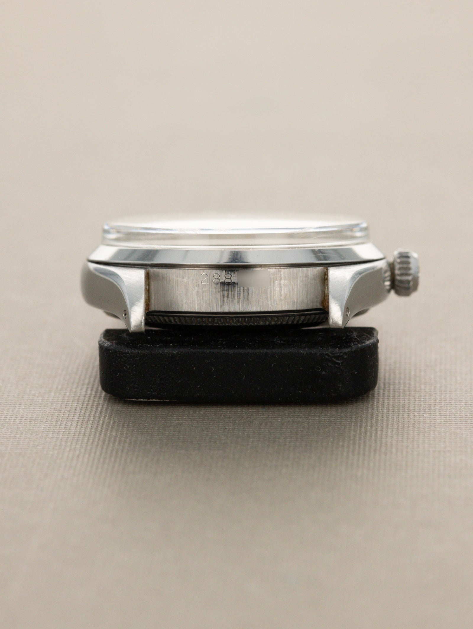 Rolex Oyster Perpetual Ref. 6564 - 'Satin' White Patina Dial
