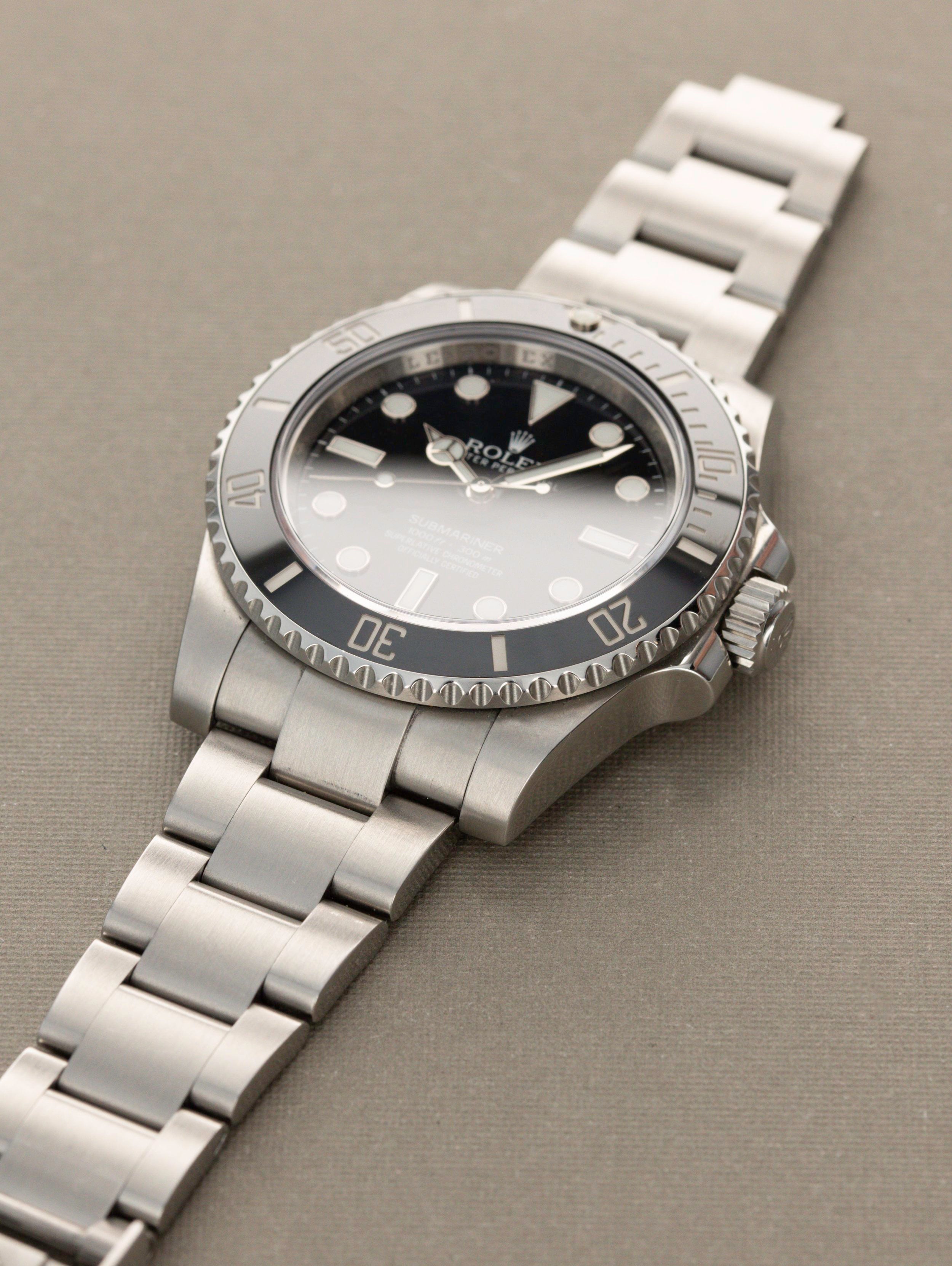 Rolex Submariner Ref. 114060 - 'No-Date' Ceramic Sub w/ box and papers