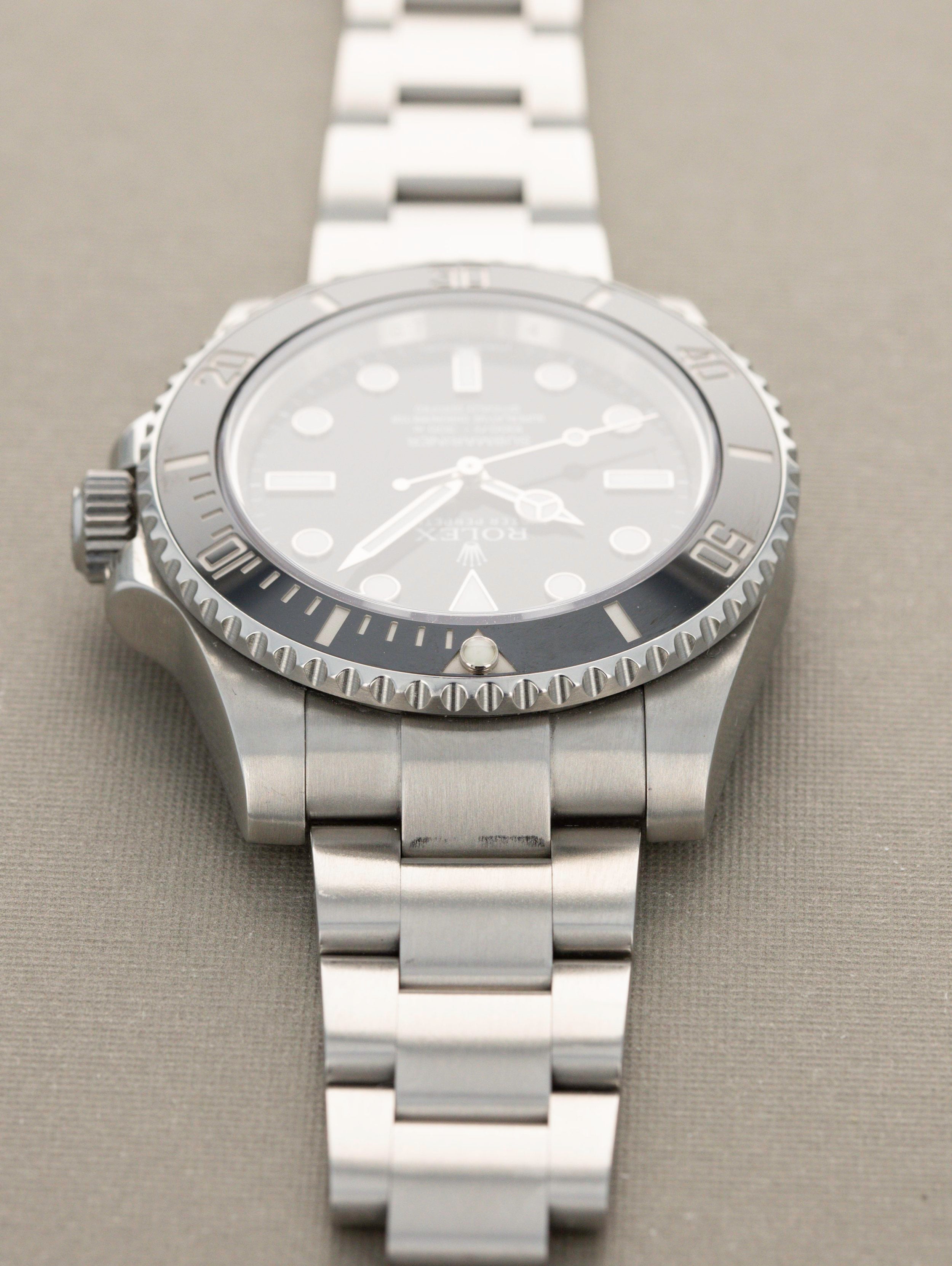 Rolex Submariner Ref. 114060 - 'No-Date' Ceramic Sub w/ box and papers