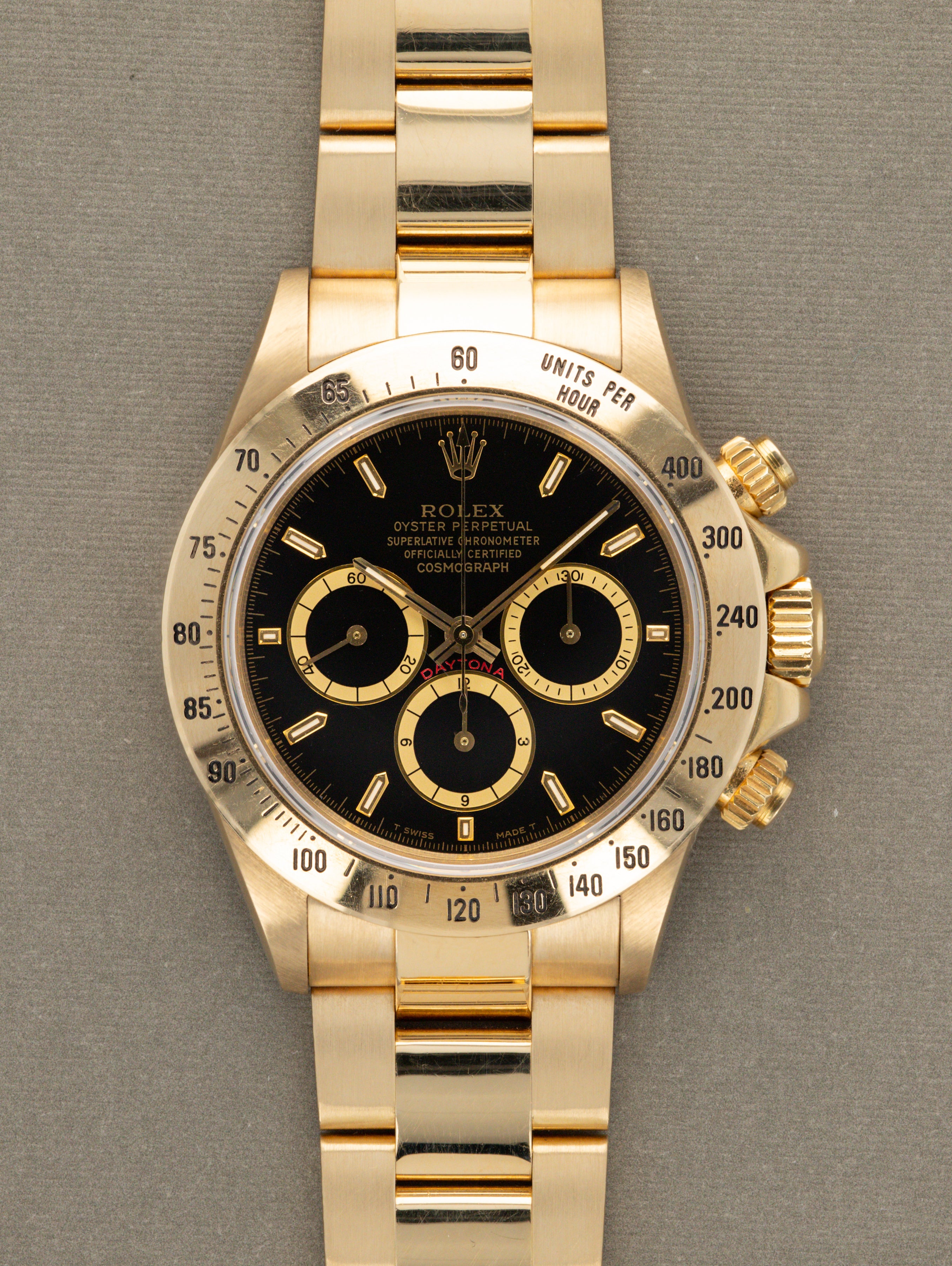 Rolex daytona sales 18k gold