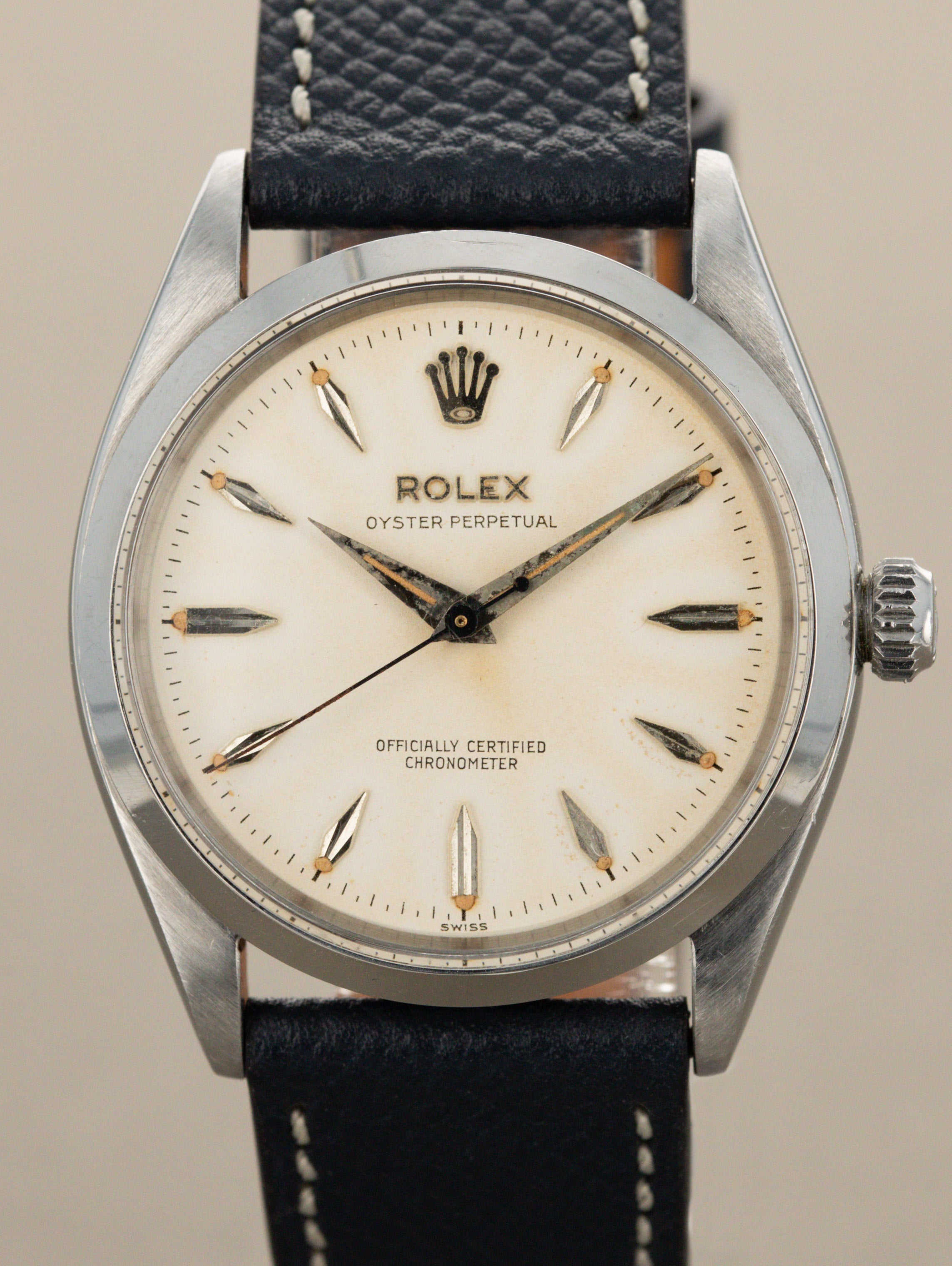 Rolex Oyster Perpetual Ref. 6564 - 'Satin' White Patina Dial