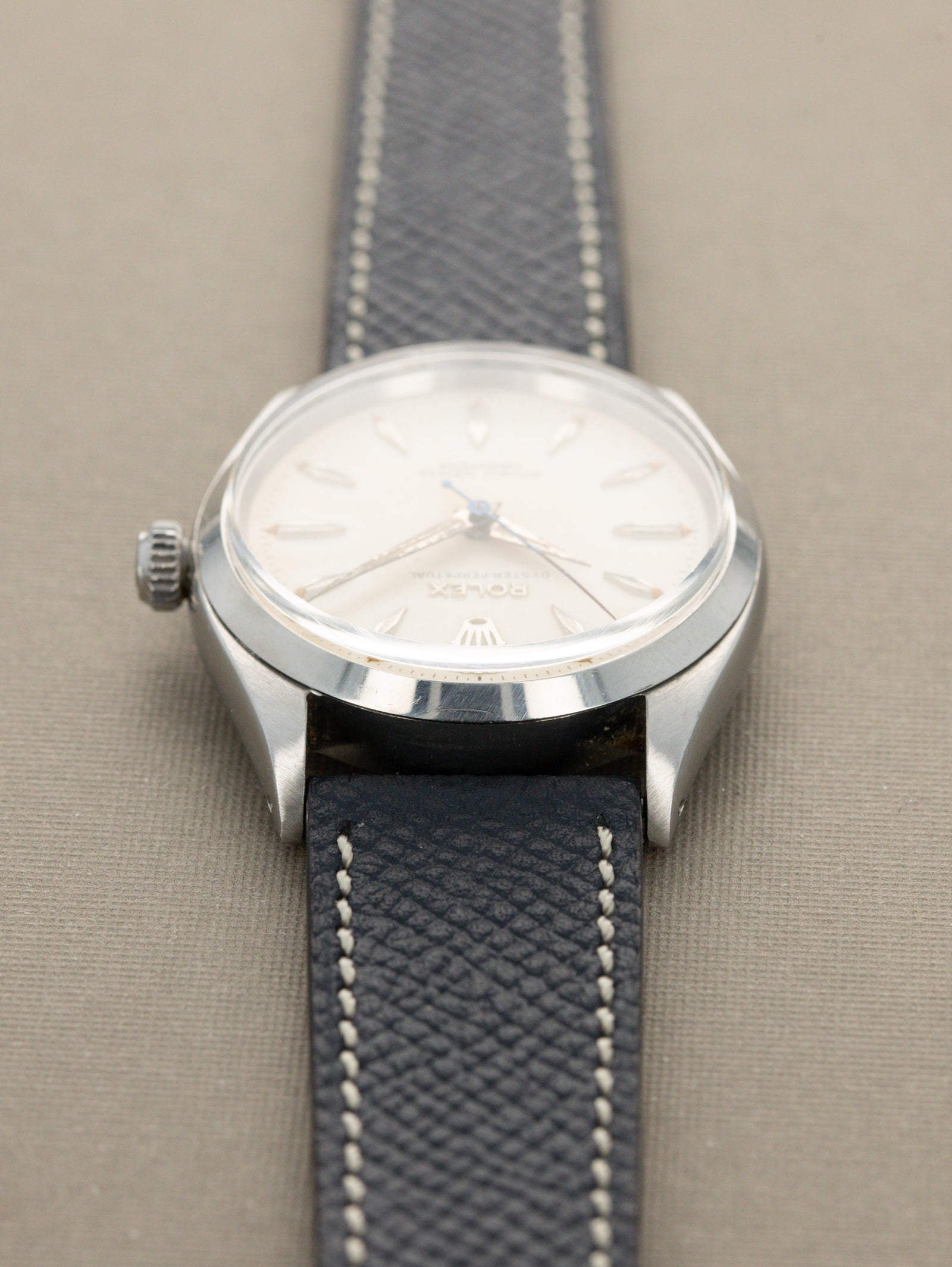 Rolex Oyster Perpetual Ref. 6564 - 'Satin' White Patina Dial