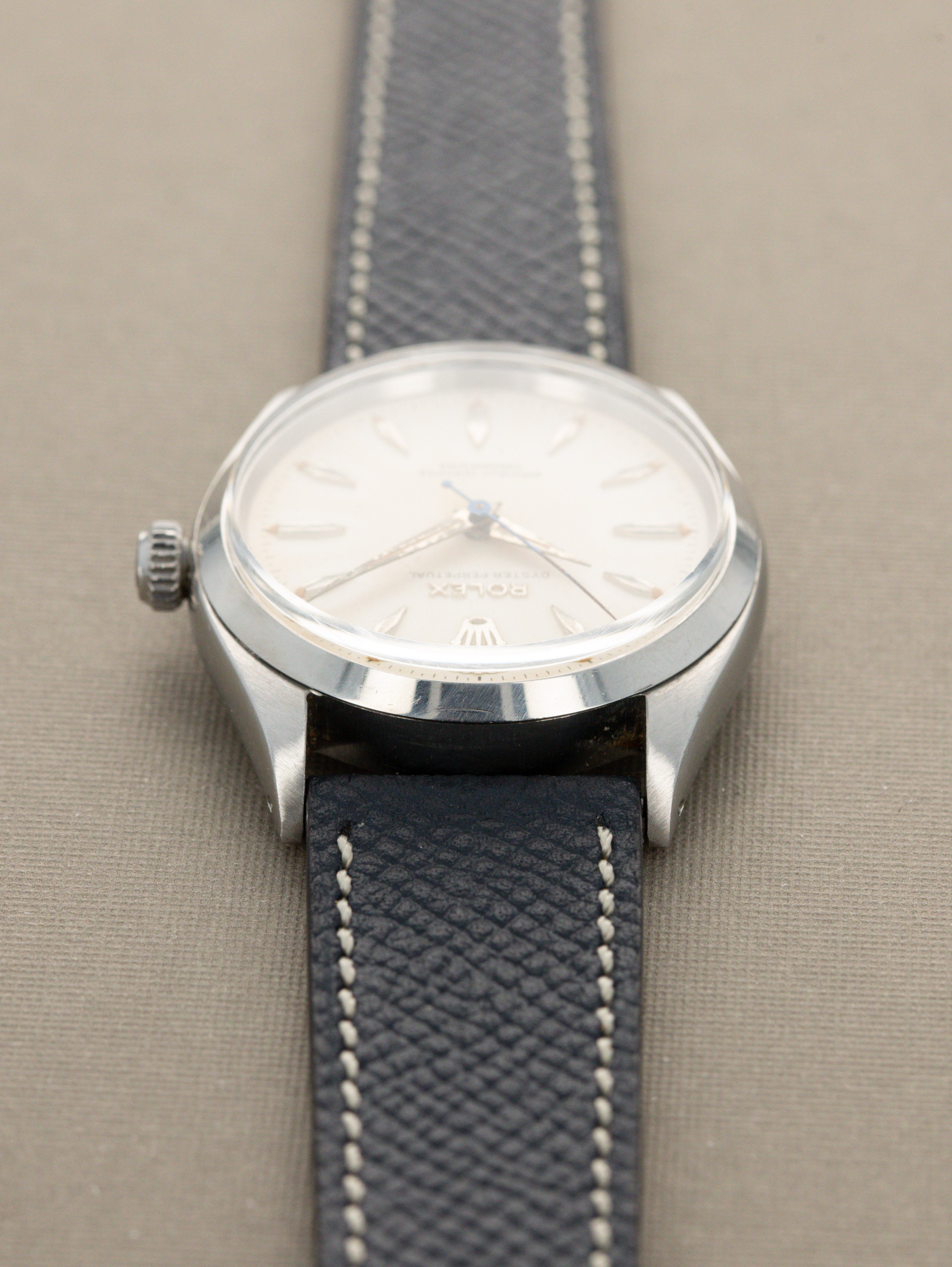Rolex Oyster Perpetual Ref. 6564 - 'Satin' White Patina Dial