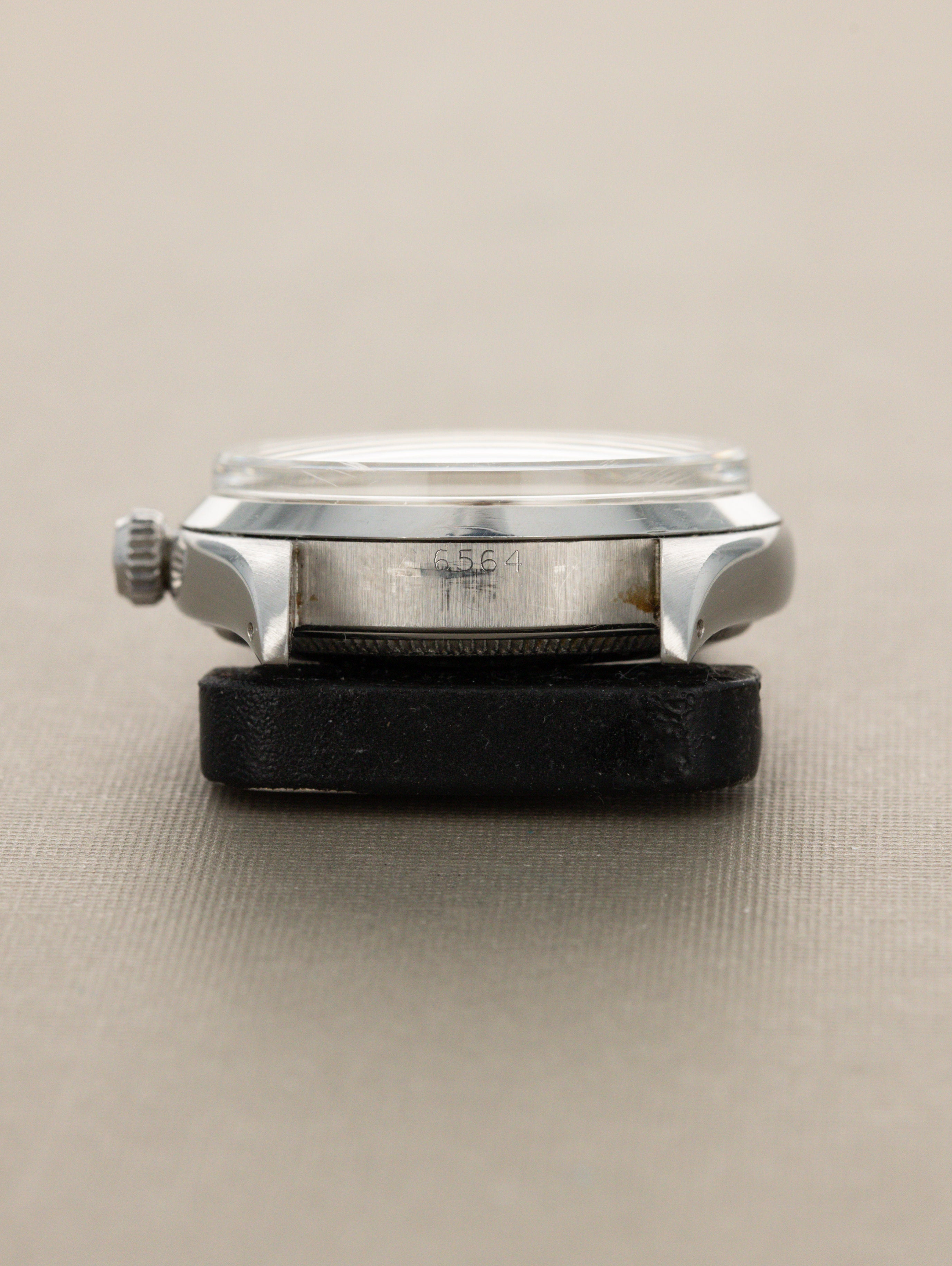 Rolex Oyster Perpetual Ref. 6564 - 'Satin' White Patina Dial