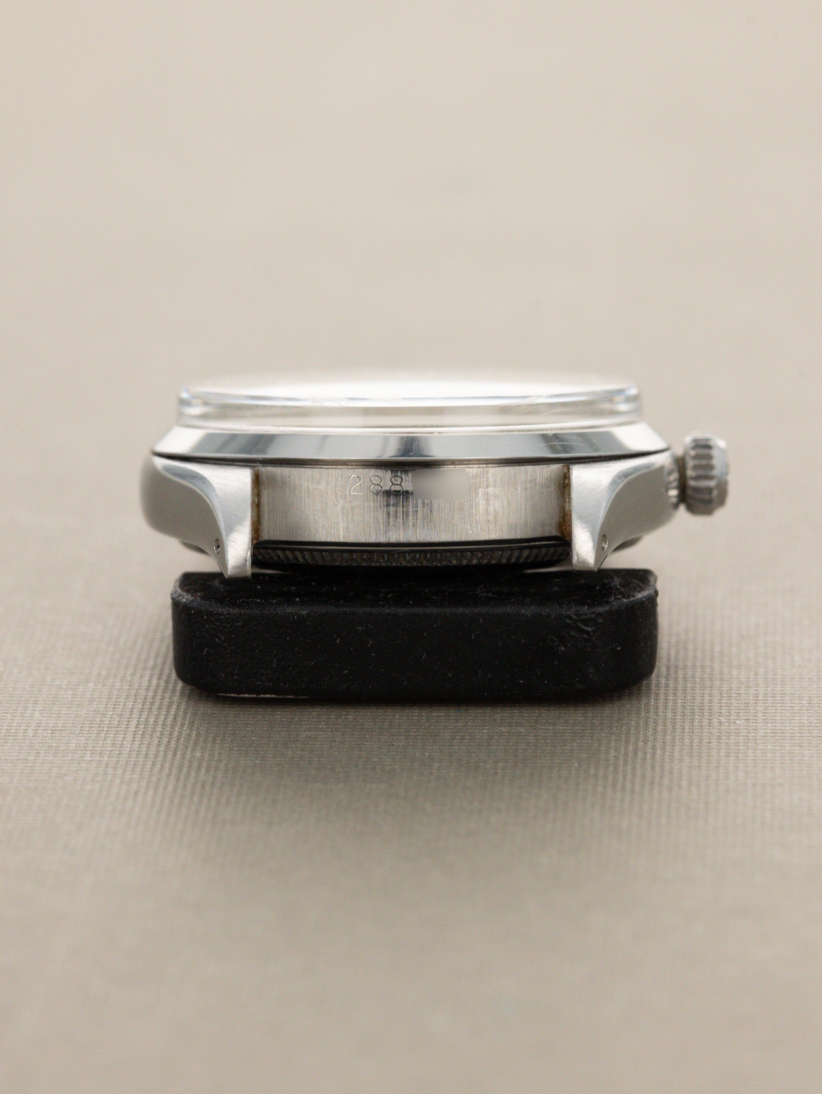 Rolex Oyster Perpetual Ref. 6564 - 'Satin' White Patina Dial